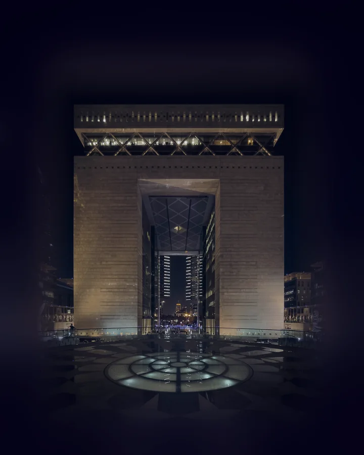 The Gate Building at the Dubai International Financial Centre, lit at night
