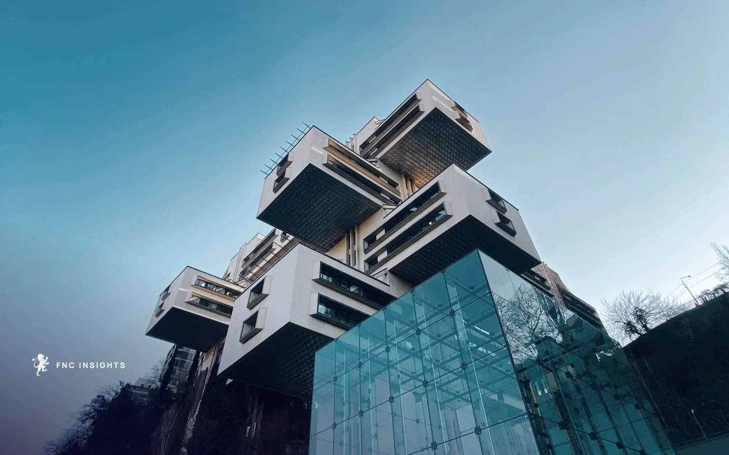 The Bank of Georgia headquarters in Tbilisi, stacked concrete blocks above a glass atrium